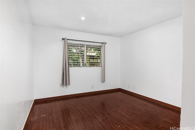 unfurnished room featuring hardwood / wood-style floors