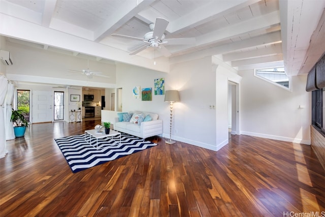 living room with a wealth of natural light, beam ceiling, dark hardwood / wood-style floors, and ceiling fan