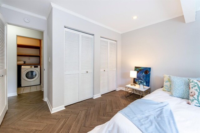 bedroom featuring multiple closets, washer / clothes dryer, recessed lighting, baseboards, and ornamental molding