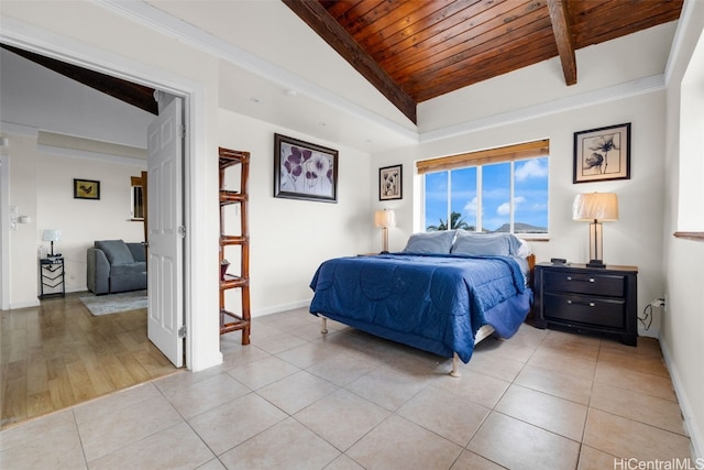 bedroom featuring lofted ceiling, light tile patterned flooring, and wood ceiling