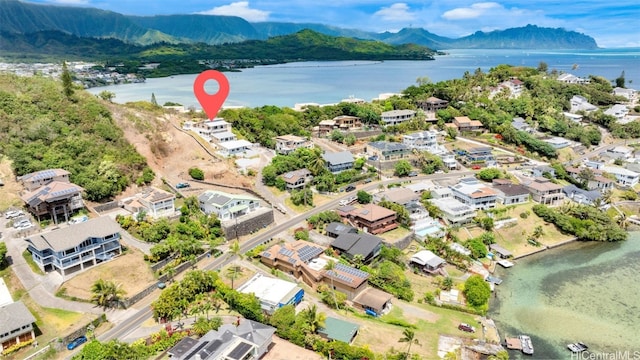 bird's eye view with a water and mountain view