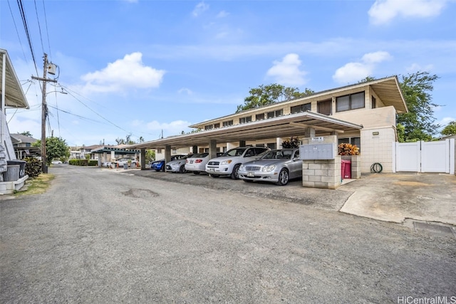 view of car parking featuring a carport