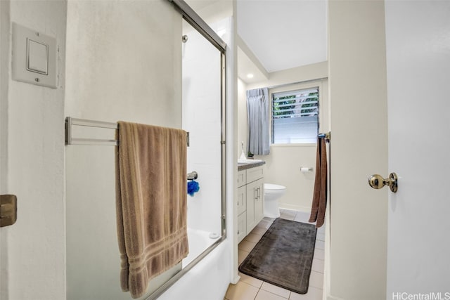 full bathroom with vanity, combined bath / shower with glass door, toilet, and tile patterned floors