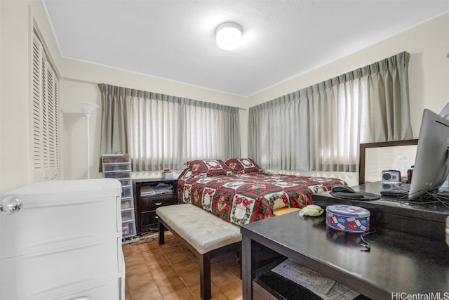 bedroom with tile patterned flooring