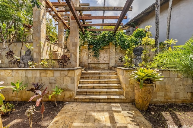 view of patio featuring a pergola