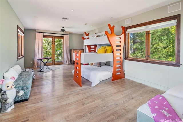 bedroom with light wood-type flooring