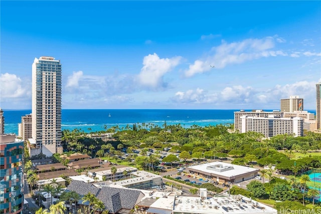 birds eye view of property with a water view