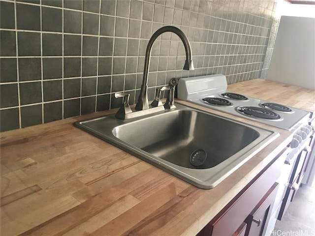 room details with decorative backsplash and sink