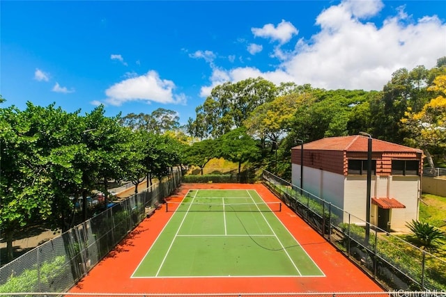 view of tennis court featuring basketball court