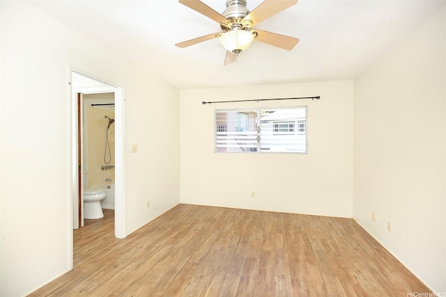 3360 E Manoa Rd Unit C, Honolulu, HI 96822 - empty room featuring light wood-style floors and ceiling fan