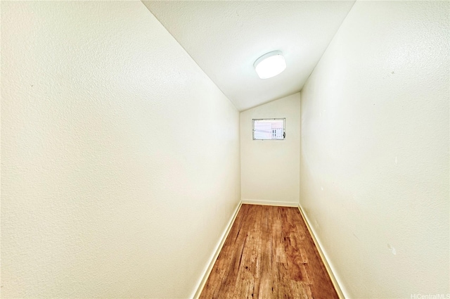 3360 E Manoa Rd Unit C, Honolulu, HI 96822 - corridor featuring wood finished floors, lofted ceiling, and baseboards