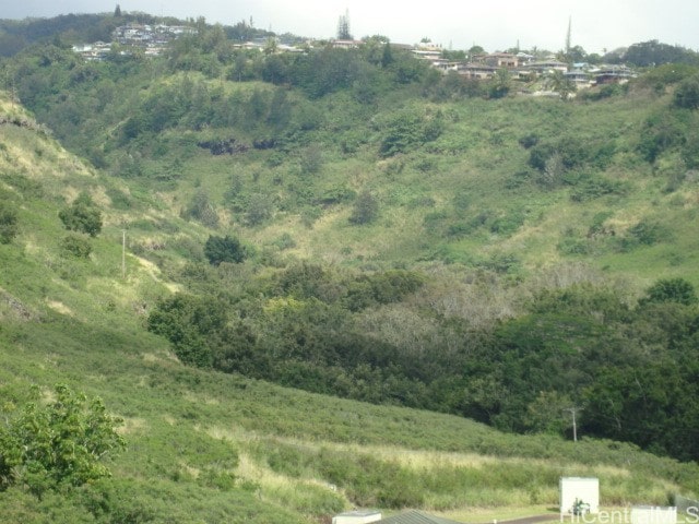 view of mountain feature with a rural view