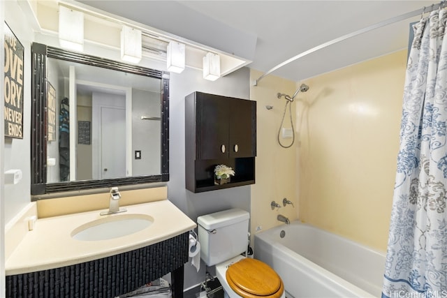 full bathroom with shower / bath combination with curtain, toilet, and vanity