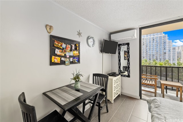 dining area with light tile patterned floors, a textured ceiling, ornamental molding, and a wall unit AC