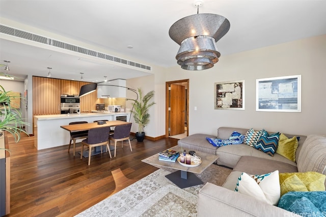 living room featuring dark hardwood / wood-style floors