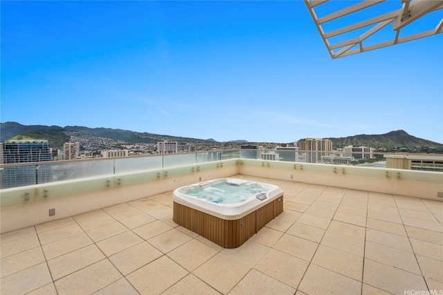 223 Saratoga Rd Unit 3801 Penthouse A, Honolulu, HI 96815 - view of patio / terrace featuring a mountain view and a hot tub