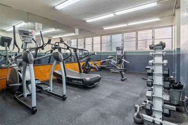 98-707 Iho Pl Unit 2-1404, Aiea, HI 96701 - gym with a textured ceiling