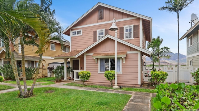 87-1950 Pakeke St Unit F, Waianae, HI 96792 - view of front of house with board and batten siding and a mountain view