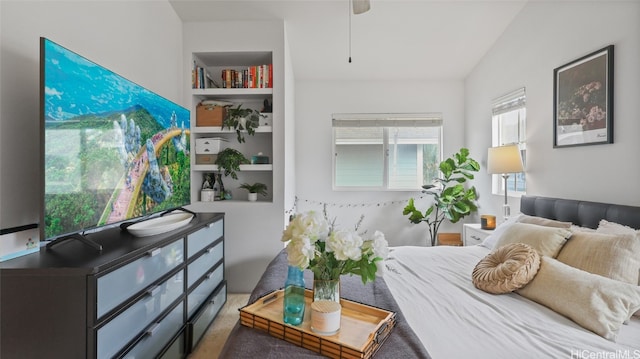 bedroom featuring lofted ceiling