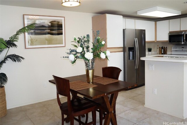 view of tiled dining room