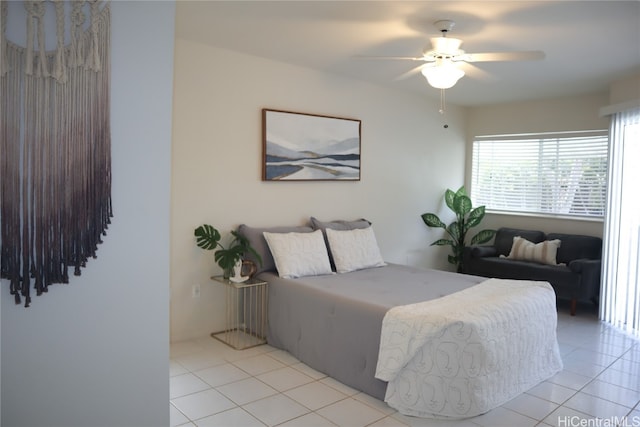 bedroom featuring ceiling fan and light tile patterned floors