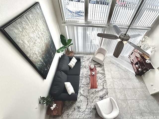 living room featuring ceiling fan