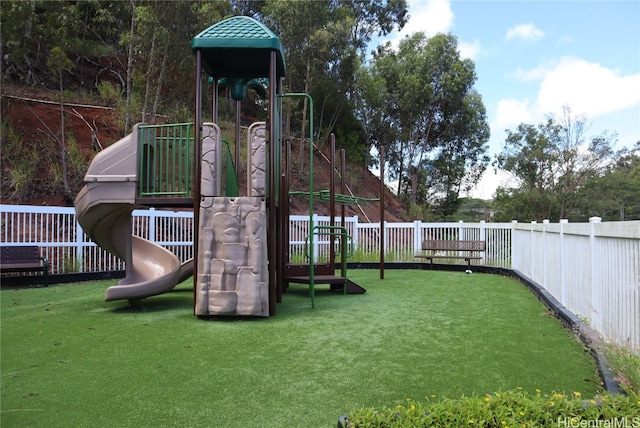 view of playground with a yard