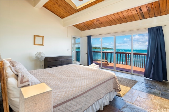 bedroom with access to outside, lofted ceiling with skylight, wooden ceiling, and a water view