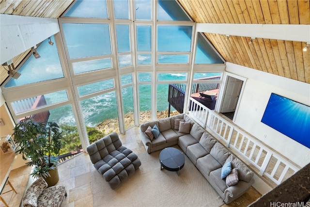 sunroom featuring wood ceiling and vaulted ceiling