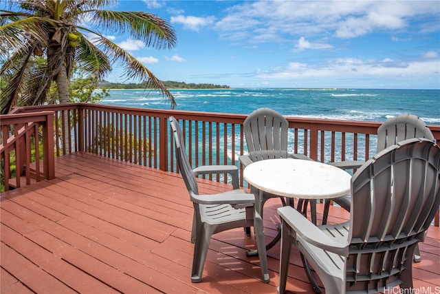 wooden deck with a water view