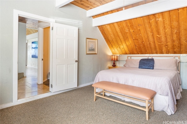 carpeted bedroom with lofted ceiling with beams and wooden ceiling