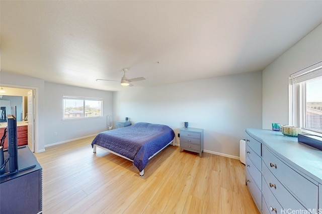 bedroom featuring light hardwood / wood-style floors and ceiling fan