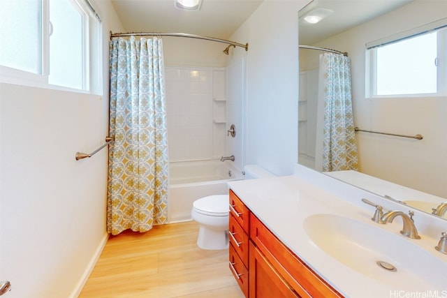 full bathroom featuring vanity, toilet, shower / bathtub combination with curtain, and hardwood / wood-style floors