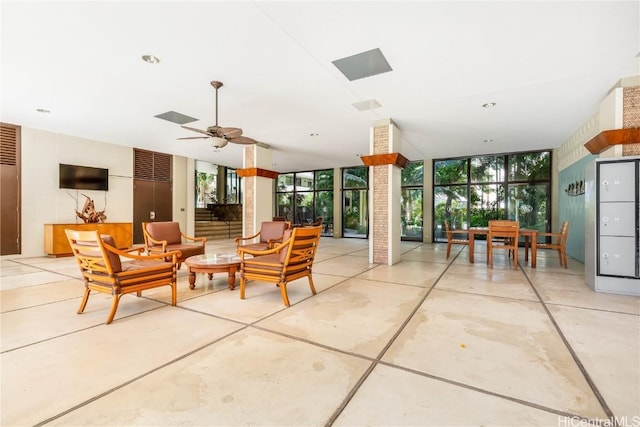 view of patio featuring ceiling fan and an outdoor living space