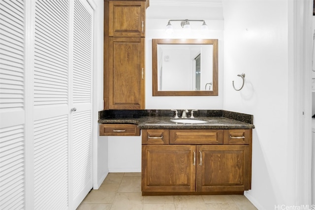 bathroom with vanity and tile patterned floors