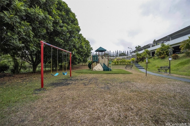 view of jungle gym with a lawn