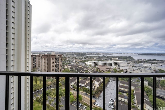 balcony featuring a water view