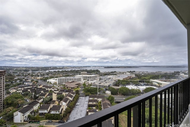 balcony featuring a water view