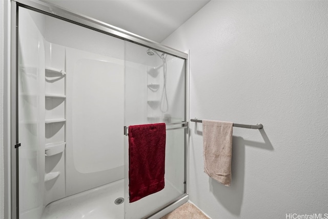 bathroom featuring walk in shower