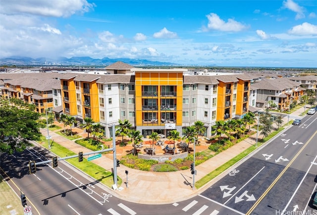 drone / aerial view featuring a mountain view