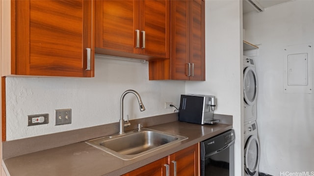 kitchen with electric panel, stacked washing maching and dryer, black dishwasher, and sink