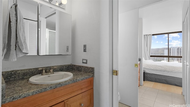 bathroom with vanity and hardwood / wood-style floors