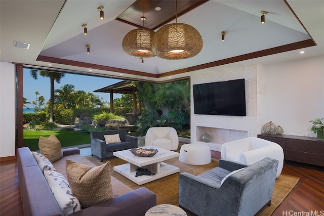 living room with lofted ceiling and dark hardwood / wood-style floors