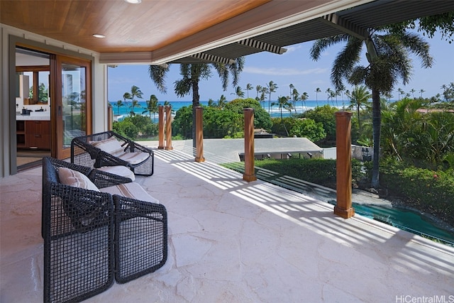 view of patio / terrace featuring a water view