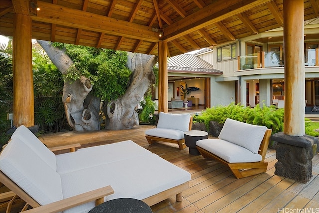 exterior space featuring a gazebo and an outdoor living space