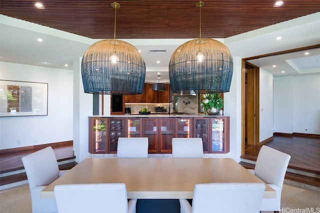 dining room with hardwood / wood-style floors