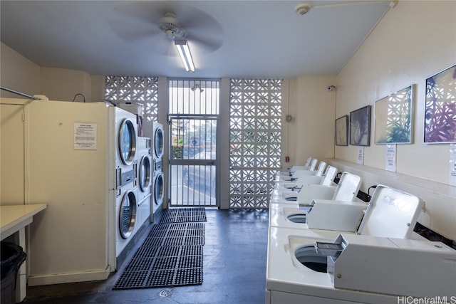 washroom with stacked washer and clothes dryer and ceiling fan