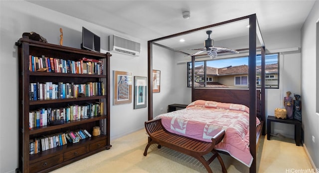 bedroom featuring a wall unit AC, light carpet, and ceiling fan