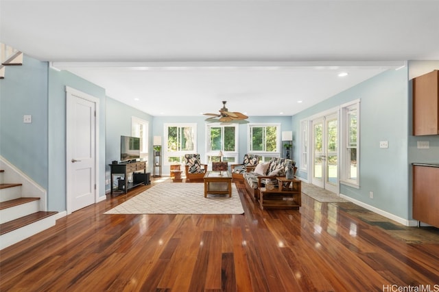 unfurnished living room featuring ceiling fan, dark hardwood / wood-style flooring, and french doors