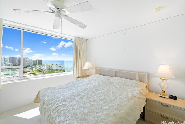 bedroom featuring ceiling fan and carpet floors